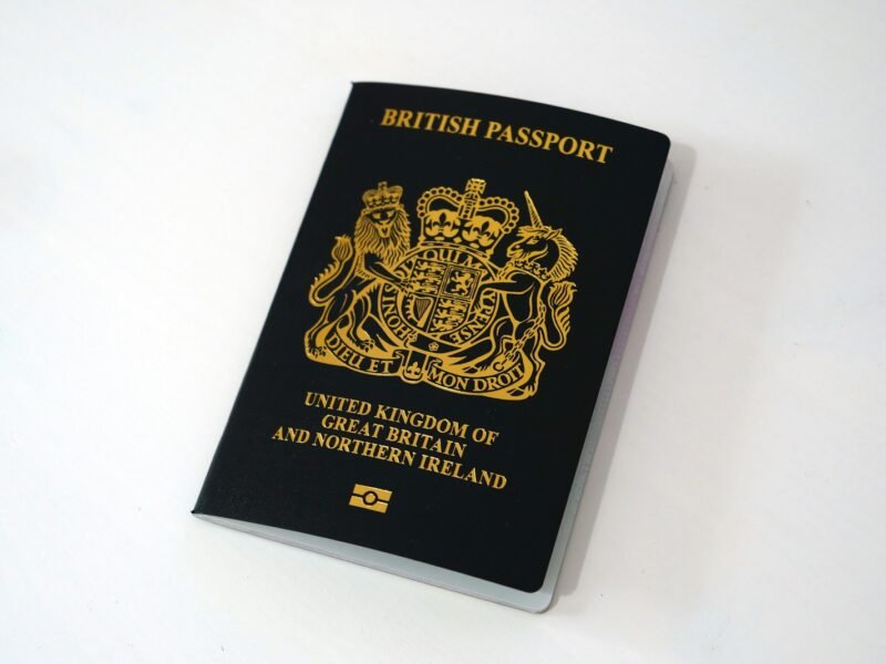 black and gold book on white table